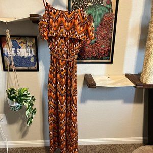 Long floor length orange spaghetti style dress with orange boho/indie pattern
